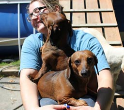 Dog licking a woman's face